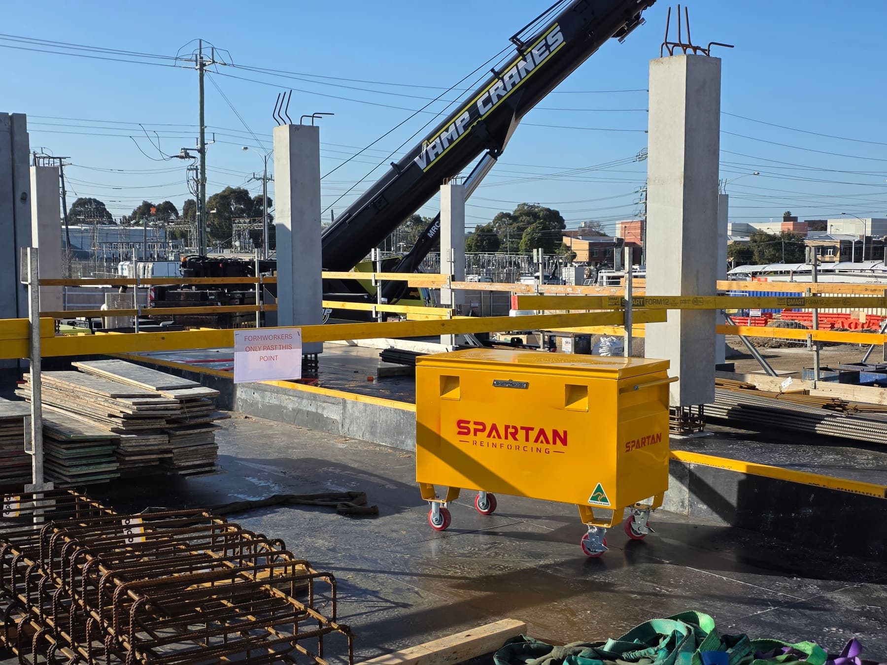 A Spartan Reinforcing site box on a bridge deck between precast columns